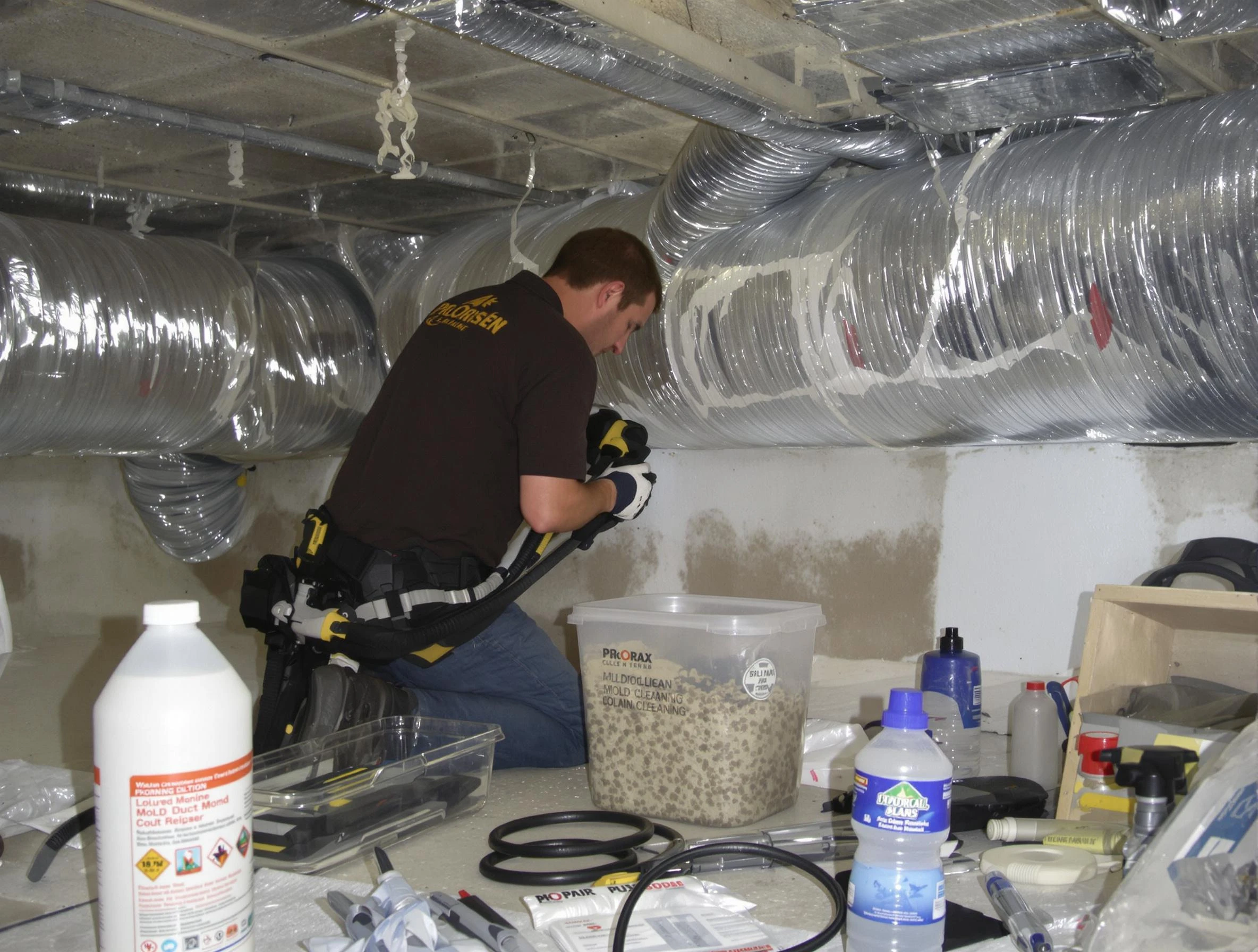 Brockton Air Duct Cleaning specialist performing professional mold removal from air ducts in Brockton